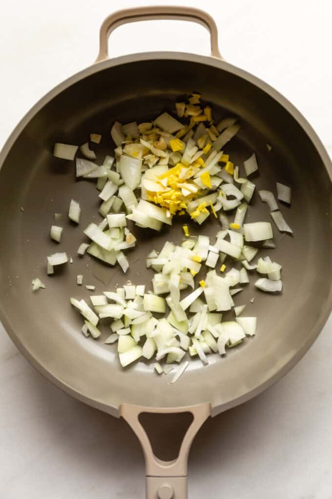 onions, garlic and ginger in a pan