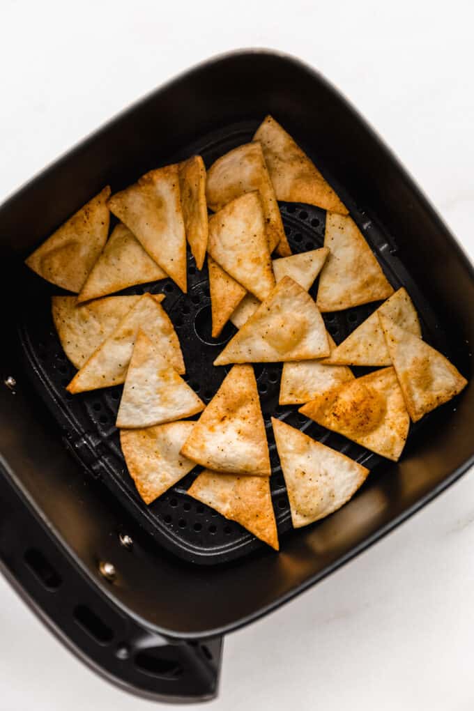 air fryer tortilla chips in an air fryer basket