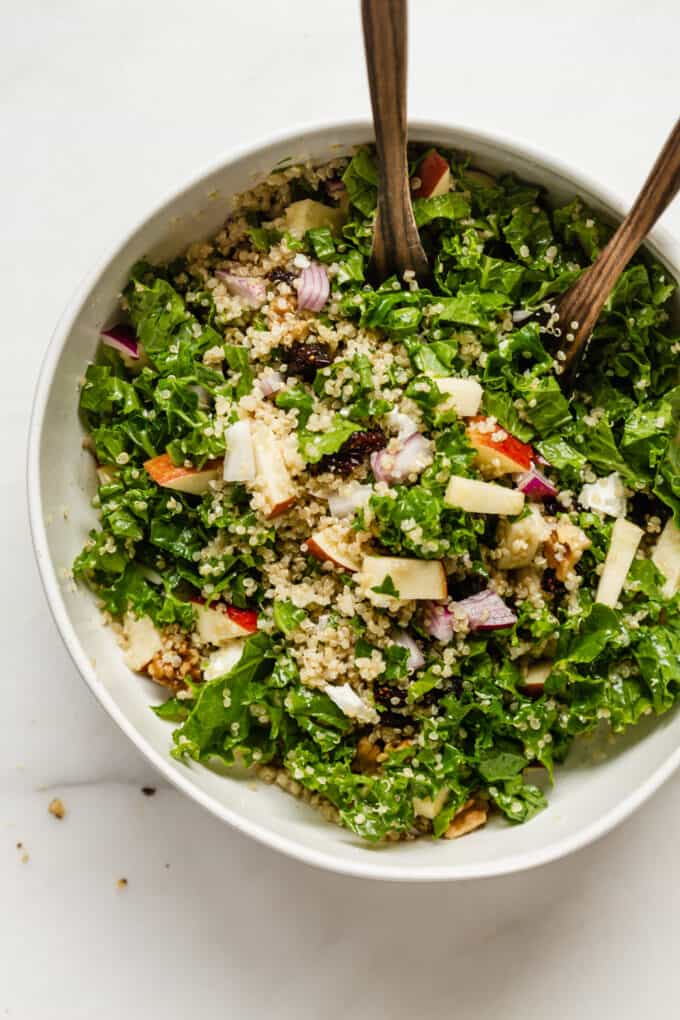 apple quinoa salad in a white bowl